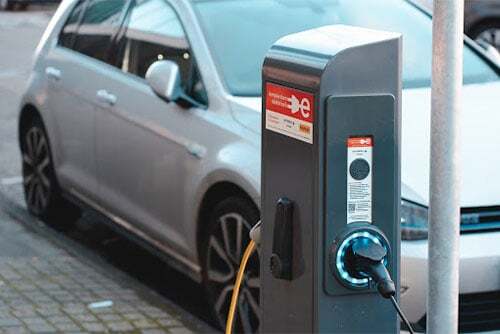 Image of electric cars charging at EV stations