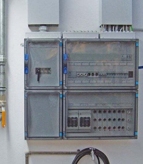 A modular enclosure box on the wall