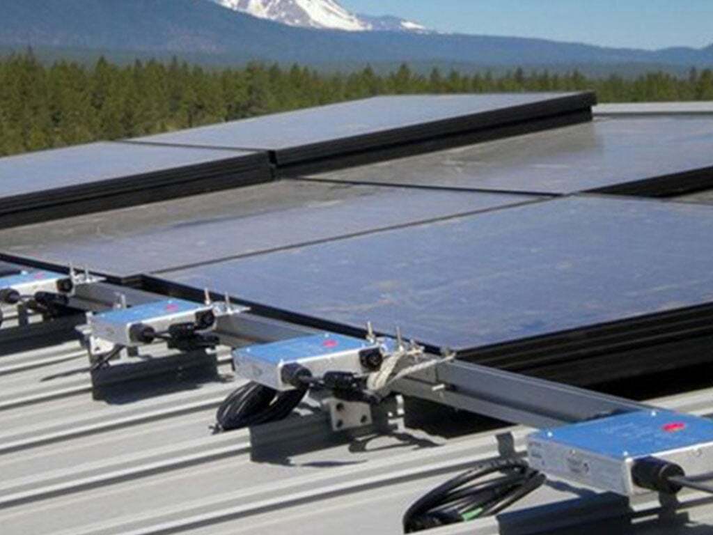 Microinverters on the rooftop operating with solar panels