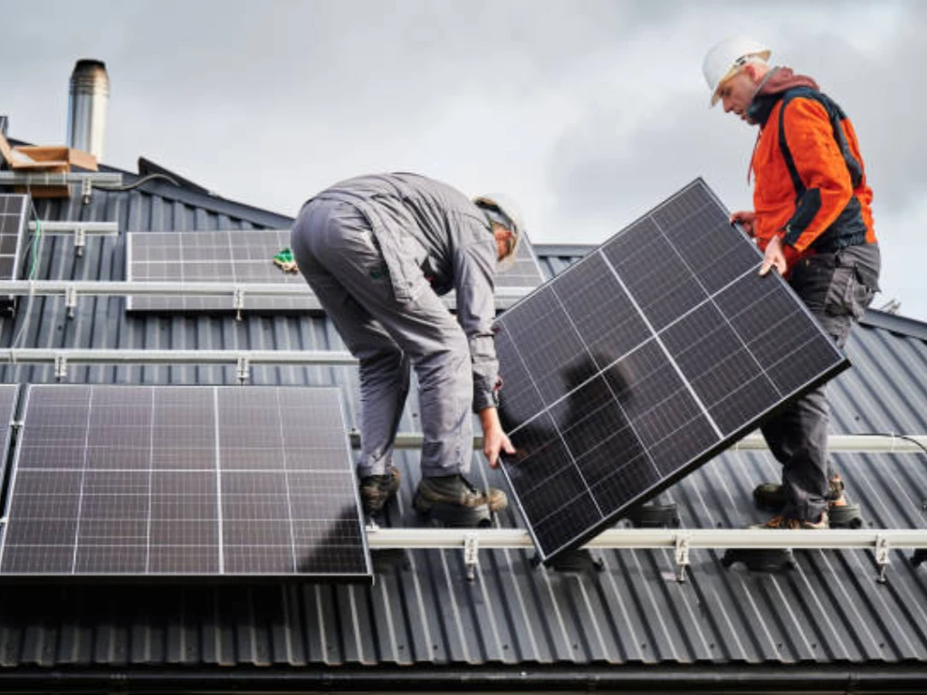 Installing Solar Panels on Roof (1)