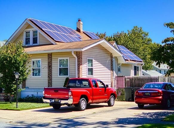 Solar panel with combiner box on rooftop